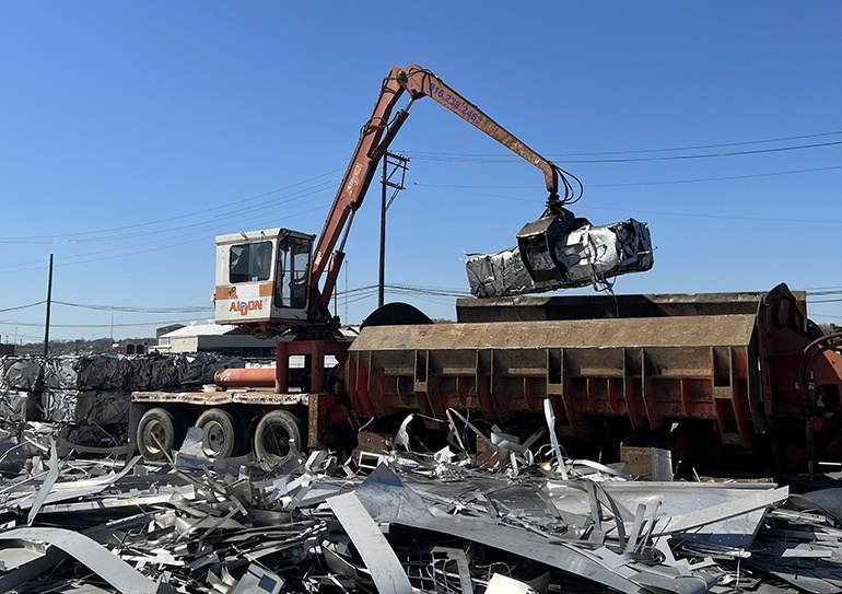 Onsite Scrap Metal Bailing Services in scrap yard